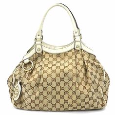 Used Gucci Handbag Gg Canvas Sukey Leather Beige Women's 211944 E58878a (Sku: Gzl13dv9) === General === Brand : Gucci === Design === Type : Handbag Material : Canvas , Leather Color : Beige Gender : Women === Size === Size (Hxwxd) : 26cm X 33cm X 7cm / 10.23'' X 12.99'' X 2.75'' === Included Items === Accessories : None Accessories Notice : Before Purchasing, Please Refer To The Images Of The Accessories Included With The Item. === Condition === Condition : Used (Good) Ranking : Rank Ab Used - T White Gucci Bag With Handles, White Gucci Shoulder Bag With Handles, Luxury Gucci Cream Bag, Luxury Cream Gucci Bag, Cream Gucci Shoulder Bag For Daily Use, Gucci Cream Shoulder Bag For Daily Use, White Gucci Bag For Everyday Luxury, Daily Use Gucci Cream Shoulder Bag, Beige Travel Bag With Horsebit Detail