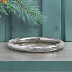 Add some texture to your stack with this gorgeous hammered ring. Made from stainless steel it is waterproof and will never tarnish! #hammeredring #texturedjewelry #mensring #unisexjewelry #stockingstuffer #giftsunder20 #waterproofjewelry #handmadejewelry #smallbusiness #womensbandring #stackingring #stainlessteeljewelry #loralyndesigns Gifts For A Man, Hammered Ring, Unisex Jewelry, Stacking Rings, Chains Necklace, Band Rings