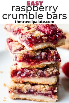 raspberry crumble bars stacked on top of each other with text overlay