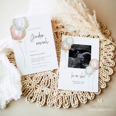 a couple of cards sitting on top of a doily next to a white blanket