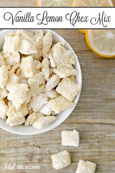 a white bowl filled with vanilla lemon cheer mix next to sliced lemons on a wooden table