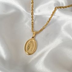 Feel and look extra divine with this golden Virgin Mary necklace; a must-have accessory for the fashion-forward and faith-filled alike. Show off your devotion and your fashion sense with a unique and stunning statement piece. ♡︎ 𝘼 𝙥𝙤𝙧𝙩𝙞𝙤𝙣 𝙤𝙛 𝙥𝙧𝙤𝙛𝙞𝙩𝙨 𝙛𝙧𝙤𝙢 𝙚𝙫𝙚𝙧𝙮 𝙤𝙧𝙙𝙚𝙧 𝙞𝙨 𝙙𝙤𝙣𝙖𝙩𝙚𝙙 ♡︎ ꕥ 𝗢𝗨𝗥 𝗝𝗘𝗪𝗘𝗟𝗥𝗬 𝗜𝗦 ꕥ * High Quality * Handmade * 100% Lead & Nickel Free  * Won't tarnish or discolour * Hypoallergenic * Recyclable ꕥ 𝗠𝗔𝗧𝗘𝗥𝗜𝗔𝗟𝗦 ꕥ * 18K Gold Pl Gold Virgin Mary Necklace, Virgin Mary Pendant, Mary Necklace, Virgin Mary Necklace, Necklace Christian, Christian Necklace, Christmas Gift For Her, Trendy Jewelry, Christmas Gifts For Her