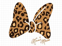 an animal print bow with the word minnie mouse on it