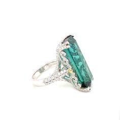 For Sale on 1stDibs - This magnificent 21.86 carat baguette cut Indicolite Tourmaline Diamond ring is mounted in white gold. This exceedingly feminine ring dazzles with the Indicolite Tourmaline, Gold Cocktail Ring, Gold Cocktail, Baguette Cut, Cocktail Rings, Diamond White, Tourmaline, Diamond Ring, White Gold