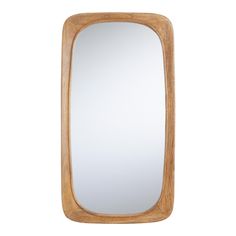 a wooden frame mirror on a white wall