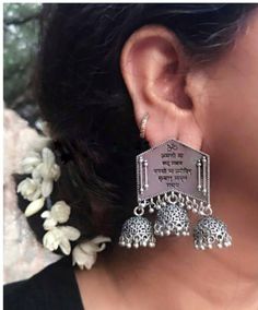 Add charm and charisma to your beautiful personality with these exquisitely designed and handcrafted high quality German Silver earrings in antique look. Pair them up with any formal or semi formal attire and gather compliments wherever you go. Suitable for both casual and dressy occasions. Note: All in stock items will be shipped from New Delhi, India within 2-3 business days after receipt of payment. International orders may take anytime between 3 to 5weeks for your shipments to reach you. som Traditional Oxidized Jhumkas For Diwali, Oxidized Jhumkas For Wedding And Navratri, Oxidized Finish Earrings For Wedding And Navratri, Traditional Oxidized Jhumkas As Gift, Traditional Brass Jhumkas With Oxidized Finish, Traditional Oxidized Brass Jhumkas, Oxidized Temple Jewelry Jhumkas For Celebration, Temple Style Oxidized Jhumkas For Celebrations, Oxidized Danglers For Wedding And Diwali