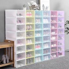 the shoe storage bins are organized with clear plastic drawers