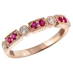 A colorful choice, here is a ring that comes set with 0.21 carats of luminous Pink Sapphires. Paired with diamonds in a 14K rose gold setting here is a ring right for any occasion. A subtle piece that adds color in the most elegant way, this is a ring that will easily find a place in your everyday jewelry. Ring Overview SKU 2764 Center Stone Pink Sapphire Side Stones Diamonds Metal Type 14K Rose Gold Metal Weight 2.95 gr Report N/A Size 7.25 Center Stone Quantity 6 Total Weight 0.21 carats Color Pink Ruby Diamond Ring With Multi-stones, Luxury Three-stone Ruby Ring In Yellow Gold, Luxury Gold Three-stone Ruby Ring, Rose Gold Stackable Rings, Luxury Pink Multi-stone Ruby Ring, Exquisite Brilliant-cut Ruby And Diamond Ring, Sapphire Side Stones, Rose Gold Metal, Sapphire Stone