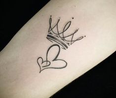 a tattoo with the word love and a crown on it