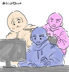 three people sitting in front of a computer screen