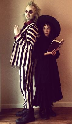 two people dressed up as beetle and the person from beetlejuice are standing next to each other