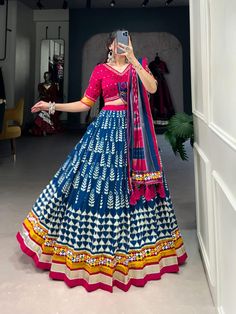 Www.saranyafashion.com WhatsApp +919833331188 Telegram  Shipping worldwide SF VB2B  Navratri Glow in Dola Silk!  *VS1743BLU* *VS1743MRN* *Lehenga(Stitched)* Lehenga Fabric : Dola Silk  Lehenga Work : Printed With Foil Work And Original Mirror Gamthi Lace Touch Up Lehenga Waist : SUPPORTED UP TO 42 Lehenga Closer : Drawstring With Heavy Tassels and Zip Stitching : Stitched With Canvas and attached with Can Can Length : 41 Flair : 3.80 Meter  Inner : Micro Cotton *Blouse (Stitched)* Blouse fabric : Dola Silk    Blouse Work : Printed And Foil Work With Gamthi And Gota Patti Lace Touch Up Blouse Size : 38" There is Extra Margin Customer Can Adjust Up to 42 Blouse Length : 15 Sleeve Length : 11 *Dupatta* Dupatta Fabric : Dola Silk  Dupatta Work : Foil Print with Original Mirror Gamthi Lace Bord Silk Lengha, Zip Stitching, Lehenga Stitched, Garba Dance, Cutwork Saree, Gota Patti Saree, Navratri Collection, Choli Dress, Lehenga Fabric