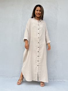 Top Rated Kaftans by Oprah Daily, Byrdi, Cosmopolitan, Elle, and more...  MALA handworks shirtdress is different, linen fabric that gets soft. Generously sized - one size fits most - is very livable and made for wearing at home. And away from home. Wide sleeves can be easily rolled to your favorite length, quality front buttons and two front pockets. SIZE & FIT INFORMATION * Bust/ Waist/ Hips 38 in (Circumference 76 in.) * Length 54 in. * Mock-neck  * Button-Front  * Long sleeve w/ buttoned cuff Long Shirt Dress With Buttons, Relaxed Fit Button-up Tunic, Long Beige Shirt Dress, Oversized Long Button Shirt Dress, Oversized Dress With Button Closure For Daywear, Long Dresses With Button Closure For Daywear, Beige Relaxed Fit Shirt Dress With Buttons, Bohemian Shirt Dress With Buttons, Bohemian Shirt Dress For Daywear