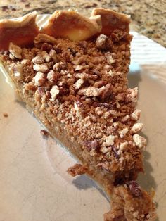 a piece of pie sitting on top of a white plate