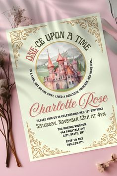 a pink and gold birthday party with an old castle on it's card board