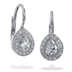 Two pear-shaped diamonds, with a total weight of 0.41 carat (F/G/SI), are set at the center and embraced by thirty-two pave-set diamonds with a total weight of 0.10 carat (G/H/VS) in these handmade 18 karat white gold lever-back earrings. Give her a gift as timeless as your love. SKU: 17626 Formal Pear-shaped Diamond Earrings With Single Cut Diamonds, Formal Teardrop Single Cut Diamond Earrings, Classic Pear-shaped Diamond Earrings With Single Cut, Anniversary Pear-shaped Single Cut Diamond Earrings, Pear-shaped Diamond Earrings With Single Cut For Anniversary, Pear-shaped Single Cut Diamond Earrings, Luxury Pear-shaped Diamond Earrings With Pave Setting, Platinum Pear-shaped Diamond Earrings With Accents, Pear-shaped Brilliant Cut Diamond Earrings