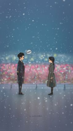 two people standing in front of a flower field with snow falling on the ground and one person holding an umbrella