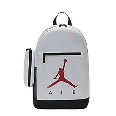 Nike Air Jordan Kids Backpack School Bag White, Red And Black Style: 9a0503-001 Size Large This Backpack Is A Classmate You'll Always Be Cool Partnering With. It Has A Large Main Compartment And Front Pocket With Plenty Of Space To Hold Your Gear For Class And Then Some. Adjustable Padded Straps Create Comfy Wear And The Included Pencil Case Can Be Attached To The Backpack So You Have A Lesser Chance Of Forgetting Your Favorite Pens Behind. Inner Pockets, Outer Pockets, Waterproof, Lightweight, White Backpack For Back To School And Outdoor Activities, White Backpack For Outdoor Activities And School, White Sports Bag For Back To School, White Sports Backpack For Back To School, Sporty White School Bag, White Sporty School Bag, Air Jordan Kids, Kids School Backpack, Comfy Wear