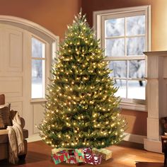 a decorated christmas tree in a living room