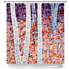 an abstract shower curtain with trees and squares on the bottom, in red, blue, orange