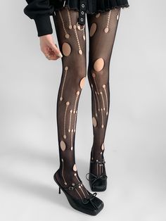 Unleash your inner fashionista with our Black Fishnet Tights. These tights feature a unique cut-out design that adds a daring twist to your outfit, while the asymmetrical pattern creates an eye-catching visual appeal. Edgy Fishnet Hosiery For Party, Edgy Fishnet Party Hosiery, Trendy Party Fishnet Hosiery, Edgy Tights For Party, Edgy Party Tights, Edgy Fishnet Tights For Party, Edgy Fitted Tights For Party, Trendy Mesh Legwear For Parties, Tight Fishnet Stockings For Party