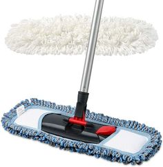 a mop with a blue and white handle sitting on top of a duster