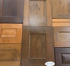 several different types of kitchen cabinets and doors with the same color, pattern or finish