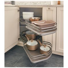 an open cabinet with pots and pans in it