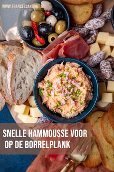 an assortment of appetizers and breads on a table with the words smelle hammouse vor op de borreplank