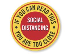 a red and yellow sticker that says, if you can read this social distancing