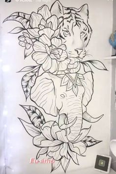 an elephant and flowers tattoo design on a white sheet with the words, in front of it