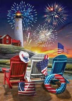 fireworks and beach chairs on the sand with an american flag