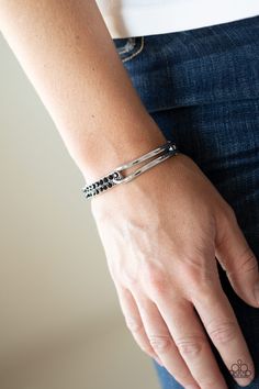 An airy silver fitting links with a silver band encrusted in two rows of glittery black rhinestones across the wrist, creating an edgy bangle-like cuff. Features a hinged closure. Live Text, Easy Jewelry, Jewelry Watch, Black Bracelet, Hinged Bracelet, Black Bracelets, Paparazzi Accessories, White Rhinestone, Paparazzi Jewelry