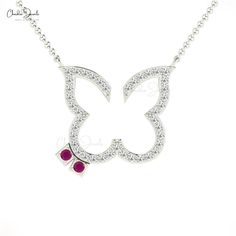 Description If she is a jewelry lover, then Ruby and diamond Open Butter Fly Necklace or you can say gemstone jewelry with sparkling white diamonds is the best gift to give her some. Assembled in 14k solid gold finish with a total metal weight of 3.26 grams. This Round -shaped Ruby with excellent cuts and transparency is twirling well with a dazzling 1.20mm pave-set diamonds. Product Details SKU CJ-N-1432-R Metal 14K Solid Gold Chain type Cable Chain Chain length 16 inch Closing mechanism Spring Elegant Butterfly Birthstone Necklaces, Diamond Necklace With Butterfly Charm For Anniversary, Butterfly Shaped Fine Jewelry Necklace For Anniversary, Fine Jewelry Butterfly Necklace For Anniversary, Butterfly Diamond Necklace For Anniversary, Diamond Butterfly Necklace For Anniversary, White Gold Butterfly Pendant Necklace For Anniversary, Anniversary Diamond Necklace With Butterfly Shape, Anniversary White Gold Butterfly Pendant Necklace