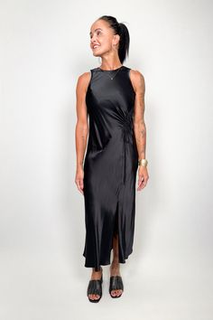 Make a statement with this flattering side slit midi dress. Made from lightweight textured crinkle satin, this dress features a unique ruched drawstring at the side body and a keyhole closure at back. 55% Rayon 45% Viscose Item# 924-136B-001 Dress Making, Dresses For Sale, Black Dress, Midi Dress, Satin, Black