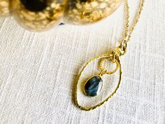 Long Gold Pendant Necklace for Women, Labradorite Necklace, Pendant Necklace Gold, Long Necklaces for Women, Gift for Her, Birthday Gift This beautiful long, gold labradorite necklace begins with a handmade gold, oval open frame pendant (created from 14 gauge brass artistic wire). Texture has been applied. A gorgeous mystical labradorite pendant has been attached to the center, along with a textured gold plated open ring. (Please note: due to the one of a kind nature of gemstones, the colors and patterns of each stone will vary slightly from the image shown.) A gold plated cable chain & matching lobster clasp complete the necklace. A 2 inch extender chain is included for length adjustments.  Such a simple, yet stunning pendant necklace!   **PLEASE NOTE: that with natural gemstones, no two Gold Labradorite Teardrop Pendant Jewelry, Gold Labradorite Oval Pendant Necklace, Gold Teardrop Labradorite Necklace, Gold Oval Pendant Necklace In Labradorite, Gold Oval Labradorite Necklaces, Gold Labradorite Necklaces As Gift, Gold Labradorite Necklaces For Gifts, Gold Oval Labradorite Necklace, Gold Labradorite Necklace For A Gift