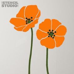 two orange flowers on a white background with the words stencil studio above them