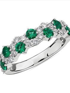 Staggered 14k white gold ring with round cut emeralds and diamonds. It's stylish, modern and fun. It's priced at $1700 but is also available in rubies and sapphires instead. Blue Nile tends to have great sales or coupons, so sign up with them to get good deals. For more, follow me at my blog https://pugswineandgirltime.wordpress.com/ Cute Engagement Rings, Emerald And Diamond Ring, Emerald Diamond Ring, White Gold Set, White Gold Wedding Rings, Half Eternity Ring, Blue Nile, Emerald Jewelry, 14k White Gold Ring