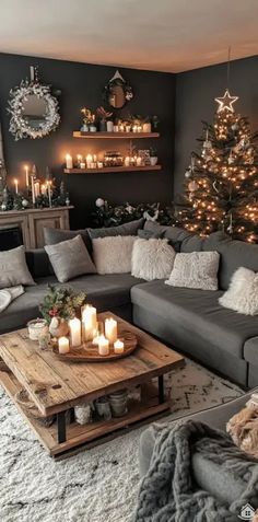 a living room filled with lots of furniture and christmas tree in the corner, surrounded by candles