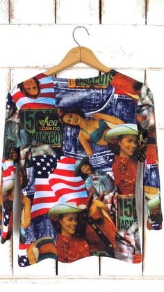 "Vintage 90s Jessica Max USA western print stretchy pullover top/USA flag/America/patriotic tshirt/cowgirl tee/4th of July Measurements... taken flat -marked size: size tag missing -estimated fit: small/medium -bust: 18\" (45.8 cm) -length: 22\" (55.9 cm) -sleeve: 16.5\" (41.8 cm) Features... -awesome USA western print throughout -super lightweight form fitting stretchy material -east to wear pullover style -3/4 length sleeves -Jessica Max USA Condition... -excellent vintage condition -minimal w Americana Long Sleeve Tops With American Flag Print, Americana Long Sleeve Tops For 4th Of July, Long Sleeve Americana Tops For 4th Of July, Patriotic Flag Print Tops For Fall, Vintage American Flag Print Tops For 4th Of July, Multicolor American Flag Print Crew Neck Top, Multicolor Graphic Print Top For 4th Of July, Patriotic Fitted Flag Print Tops, Fitted Patriotic Tops With Flag Print