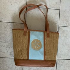 New Thirty One Bag! Perfect For The Beach Or As An Every Day Bag. Only Used A Handful Of Times. No Marks Or Stains. Still Has That Brand New Smell Hah! If You’ve Gotten A New Bag You Know Exactly What I’m Talking About! Casual Sand-colored Shoulder Bag For Travel, Casual Sand Shoulder Bag For Travel, Tan Straw Tote Bag For Vacation, Tan Beach Bags With Leather Handles, Tan Beach Bag With Leather Handles, Casual Blue Straw Bag With Leather Handles, Tan Shoulder Bag With Leather Handles For Beach, Tan Leather Handles Shoulder Bag For Beach, Tan Tote Beach Bag