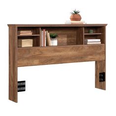 a wooden desk with bookshelf and shelves on it's sides, against a white background