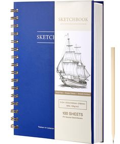 a blue sketch book with a pencil next to it