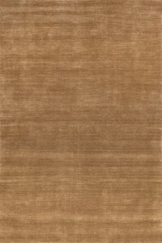 an area rug that is made out of brown fabric