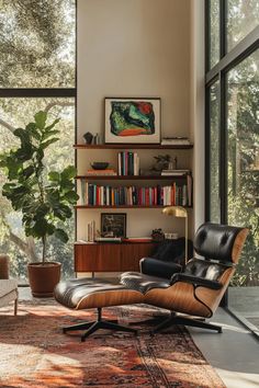 a living room filled with furniture and a large window covered in lots of glass doors