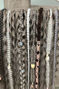 Discover this unique set of soft boho dreadlocks in ash blonde and gray. Reusable and stylish, these feminine dreads are perfect for any look and make a thoughtful personalized gift for girls and moms. #CurlyDreadlocks #BohemianBraids #HairGiftForHer