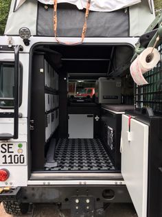 the back end of a van with its doors open