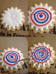 three decorated cookies with red, white and blue icing on top of each cookie