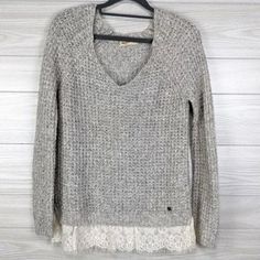 HOLLISTER Gray Sweater with Lace Trim Long Sleeves:  Sz: XS Color: Gray with Off White Lace trim on hem Long Sleeves  Pullover V- Neckline  Measurements taken flat, without stretch Back shoulder to shoulder: 15" across Back neckline to length: 26" long Front armpit to armpit: 16.5" across Sleeve underarm to length: 19" long Condition: Excellent as pictured, with no flaws Please see photos for better description 6-DW1 Sweater With Lace, Gray Sweater, Pullover Sweater Women, Women Pullover, Sleeveless Blouse, Long Sleeve Pullover, Silk Blouse, Grey Sweater, Knit Cardigan