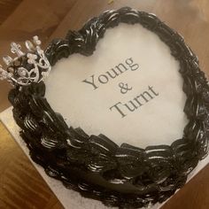 there is a cake that says young and tumti on the top of it